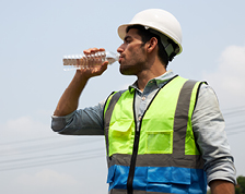 Surveyors working in the sun